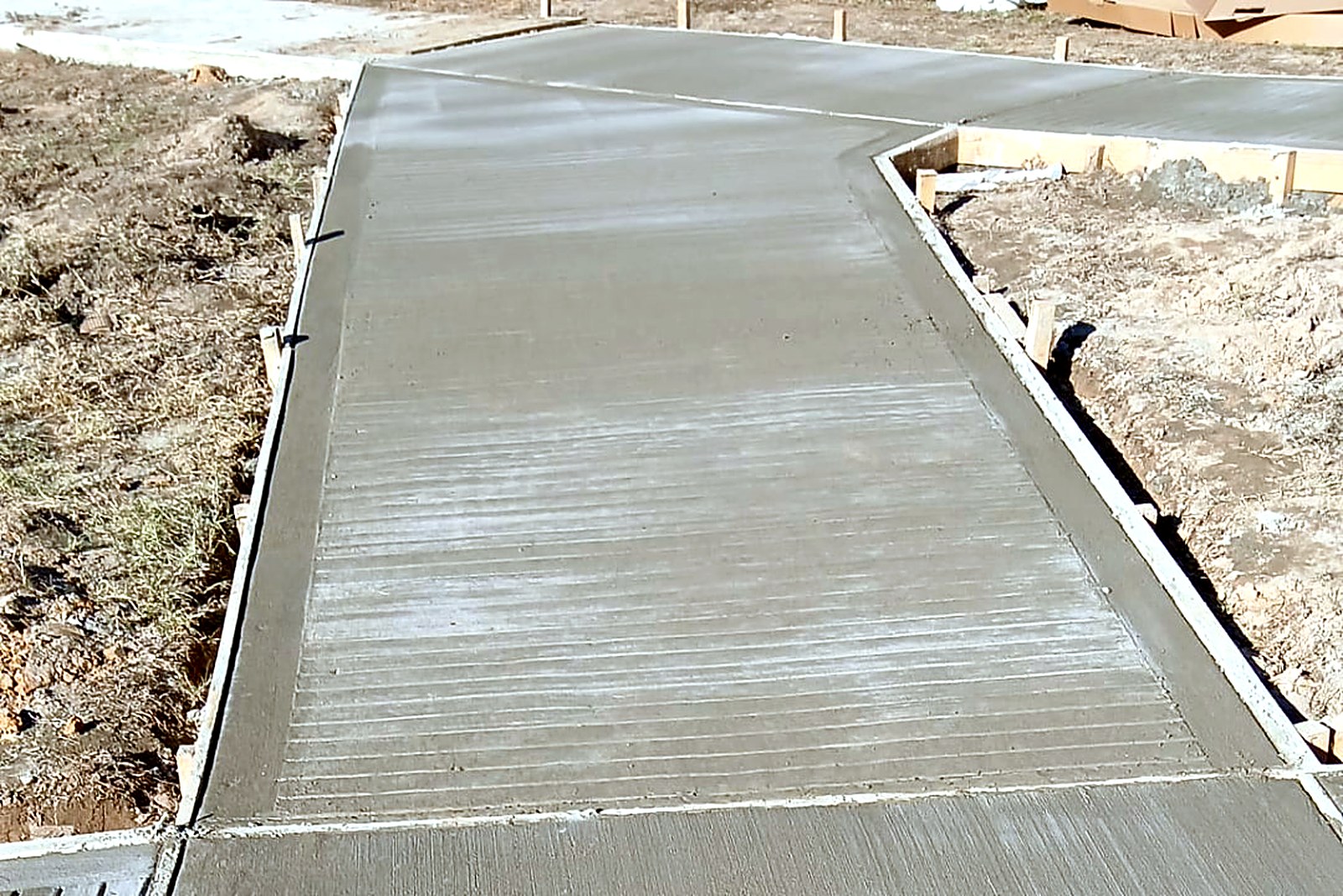 Concrete sidewalk panels with a light broom finish